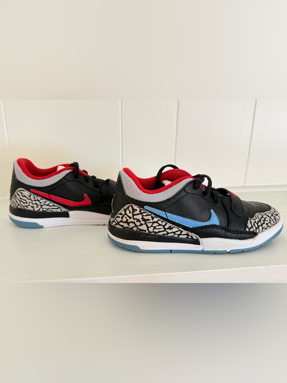 Jordan Kids Black Sneakers with Red & Blue Swooshes